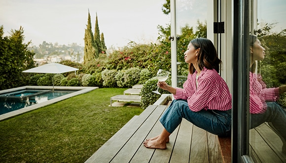 Woman contemplating her alcohol consumption