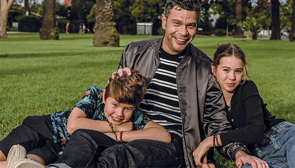 Dylan Lewis with his children talking about parenting tips for tweens