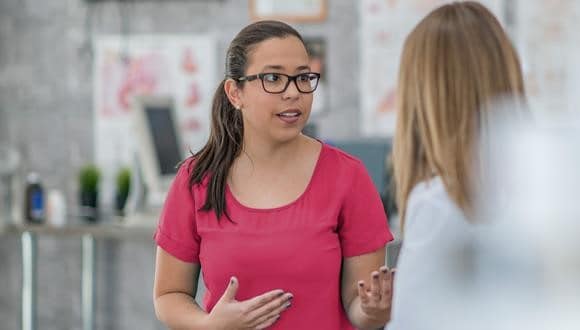 Two women discussing endometriosis treatment options