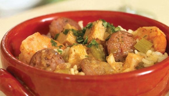 Slow-cooked Jambalaya recipe served in a pot with rice